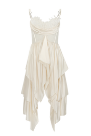 White dress with floral details on a white background