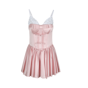 Pink satin nightgown with lace details on a white background