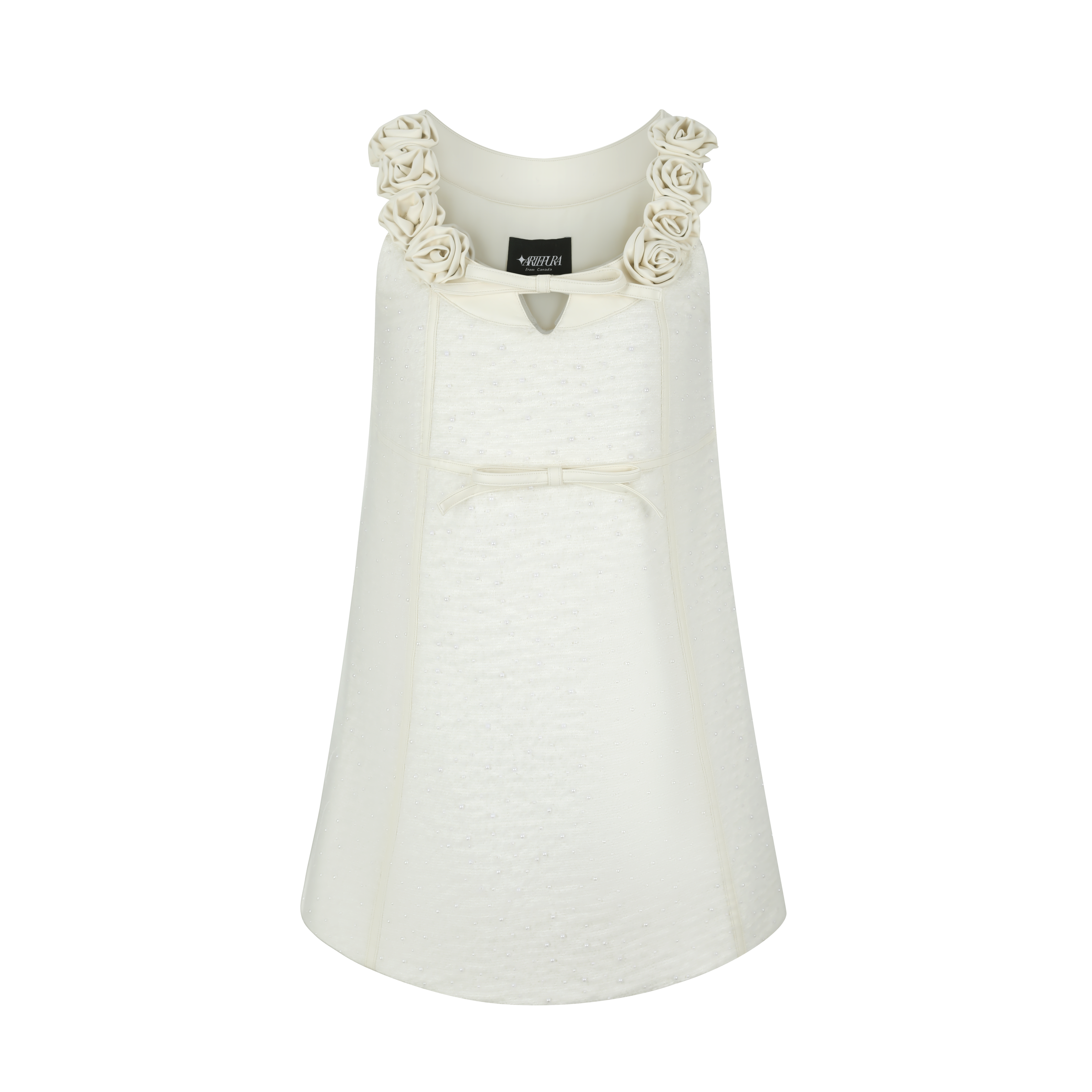 White dress with floral embellishments on a white background